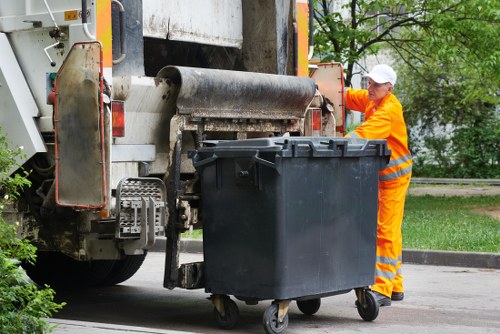 Safe disposal of garden waste by an insured rubbish removal crew
